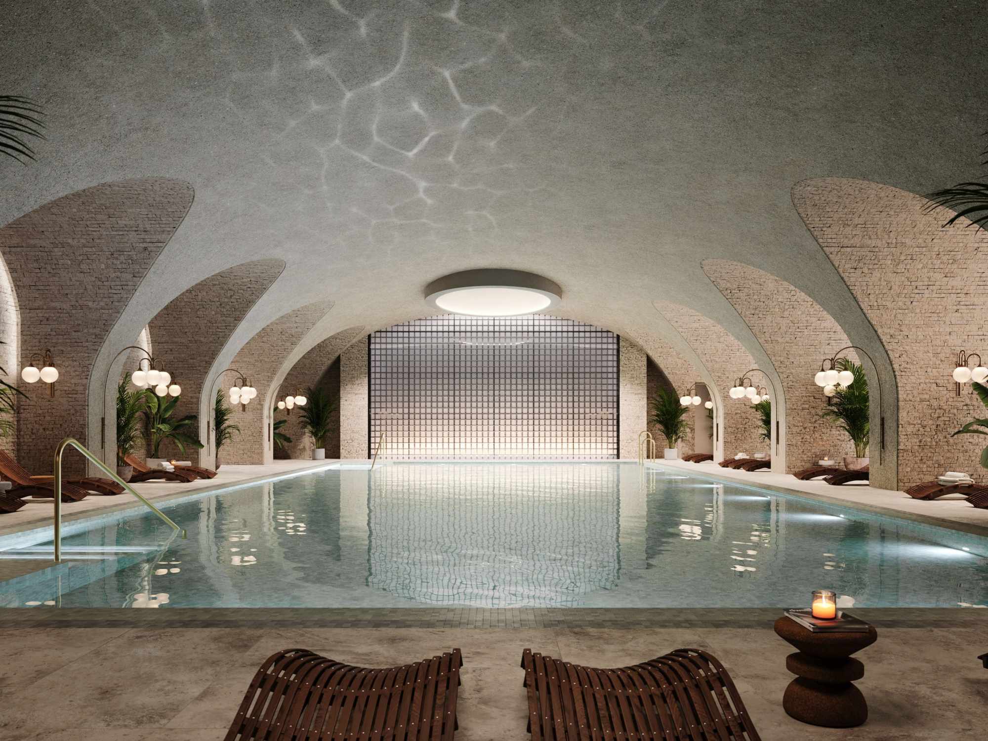Six Senses London spa interior with indoor pool inside the restored Whiteley building in Bayswater