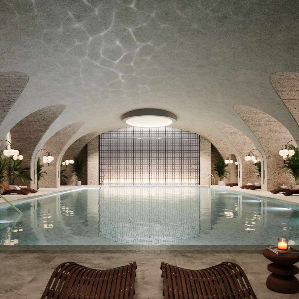 Six Senses London spa interior with indoor pool inside the restored Whiteley building in Bayswater