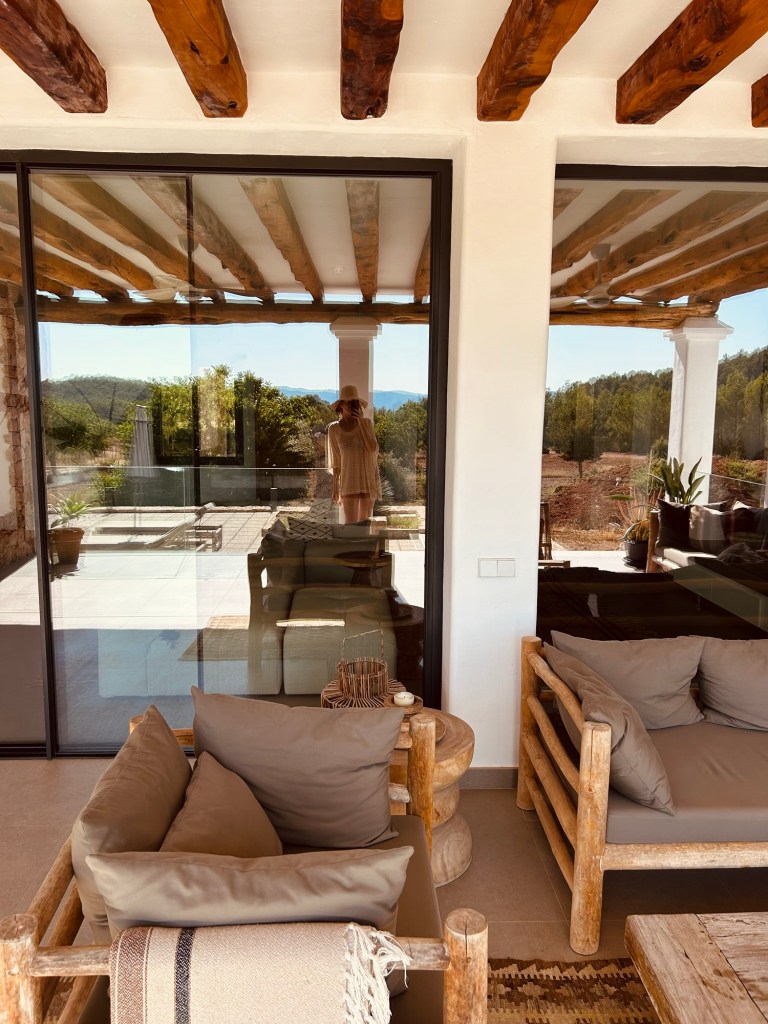Villa terrace overlooking trees and countryside in Ibiza north
